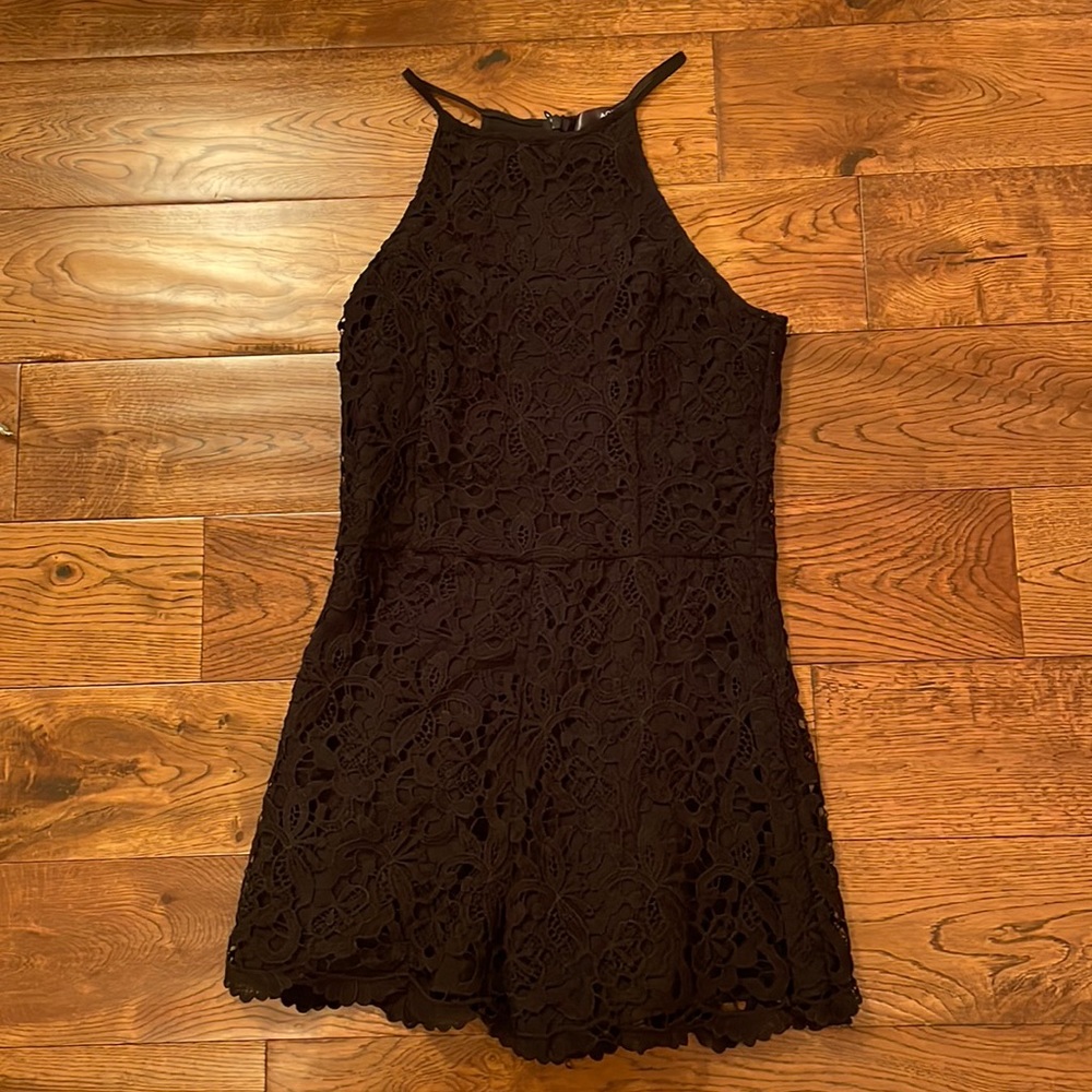 Black floral pattern romper